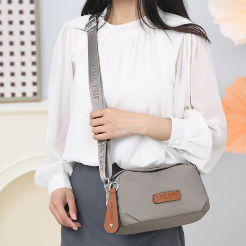 Nova Shield Crossbody Bag
