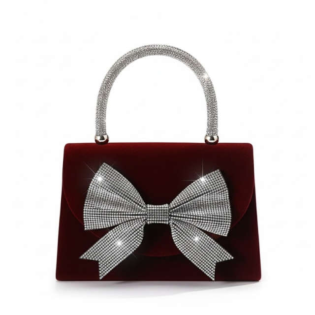 Elegant Velvet Handbag with Oversized Crystal Bow