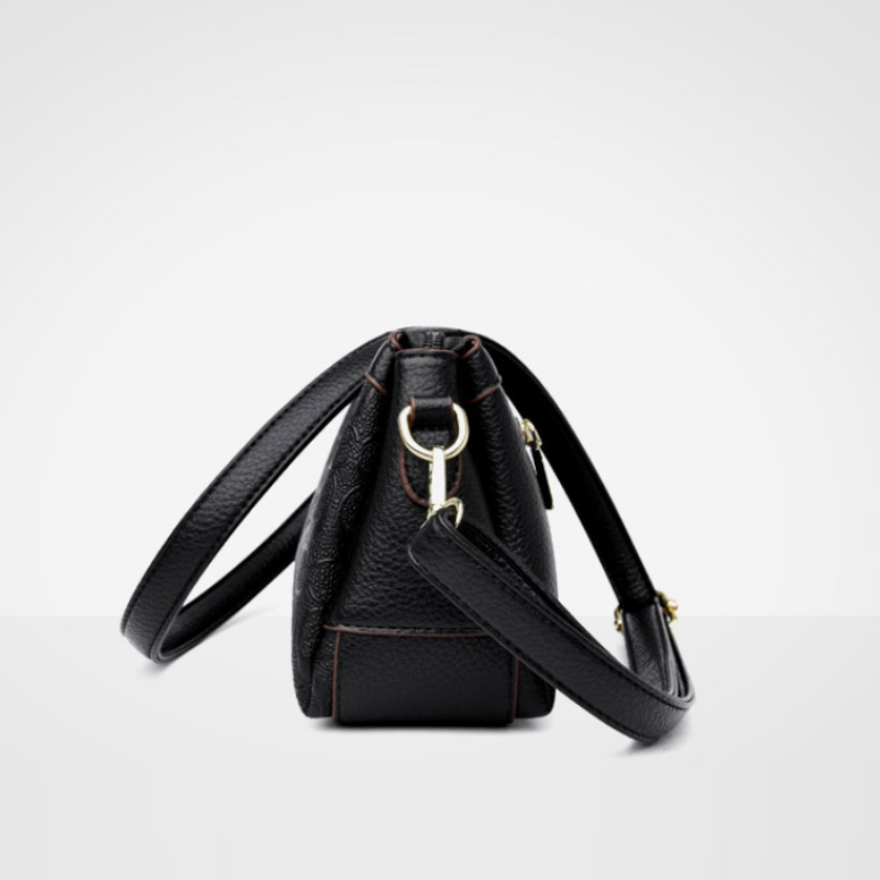 Noir Embossed Accordion Crossbody Bag