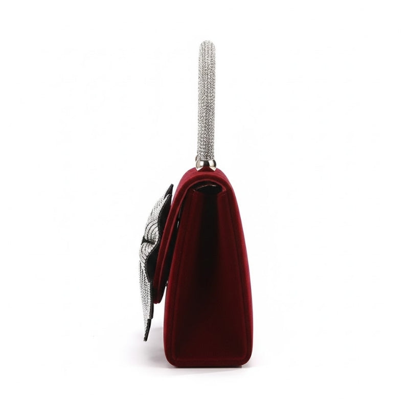 Elegant Velvet Handbag with Oversized Crystal Bow