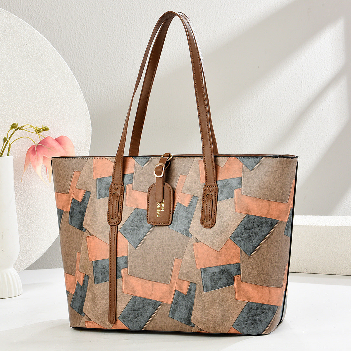Graceful Arc Shoulder Bag