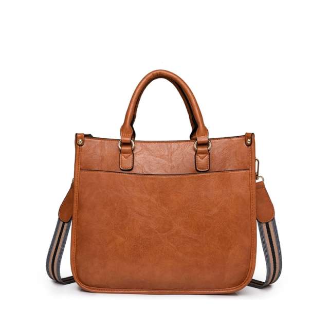 Modern Curved Twist Lock Asymmetrical Handbag