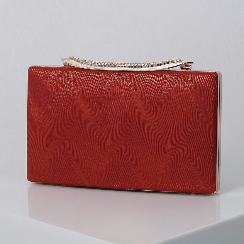 Elegant Shimmering Clutch with Rhinestone Handle