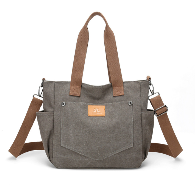 Multi-pocket canvas shoulder bag with large capacity durable fabric
