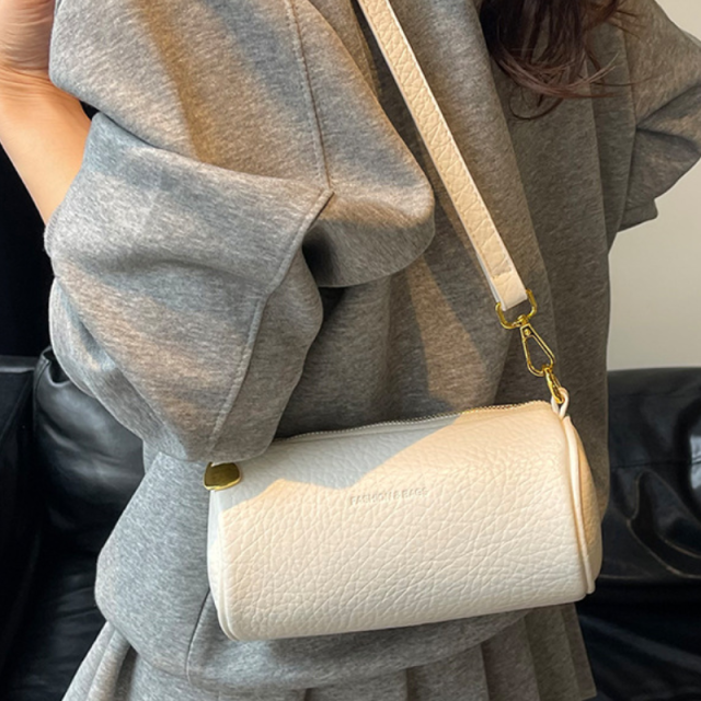 Elite Roll Crossbody Bag