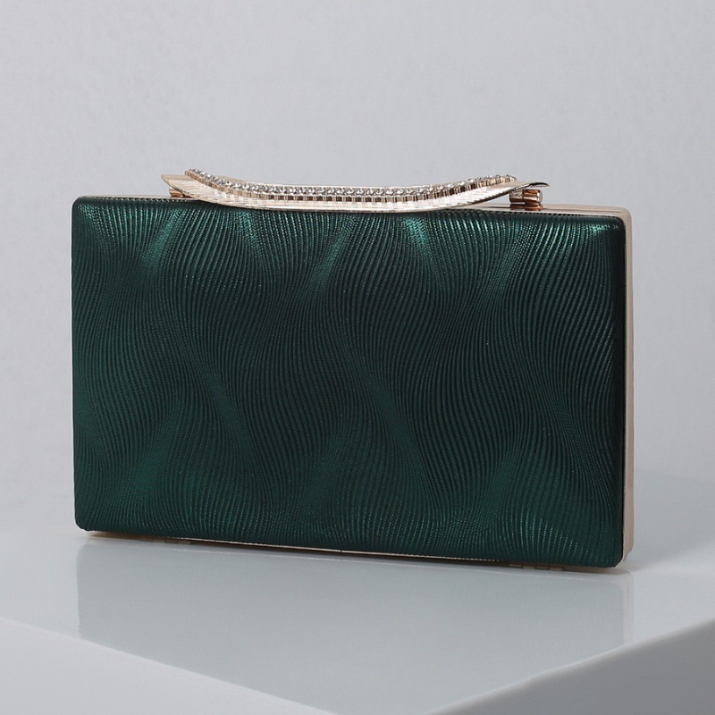 Elegant Shimmering Clutch with Rhinestone Handle