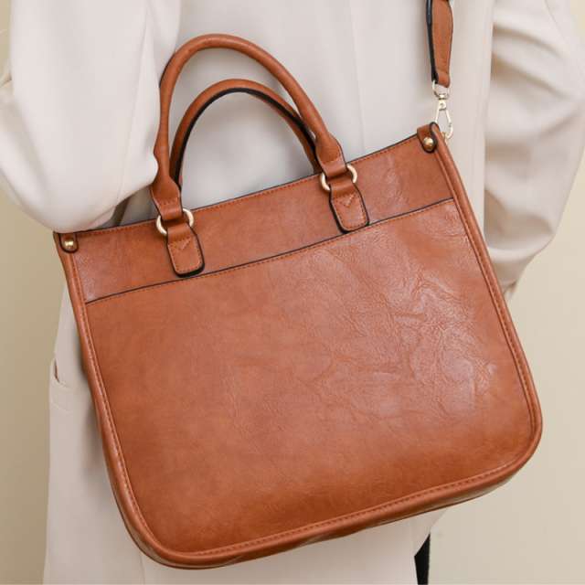 Modern Curved Twist Lock Asymmetrical Handbag