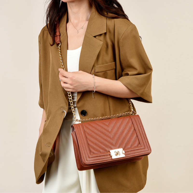 Vela Quilted Chain Crossbody Bag