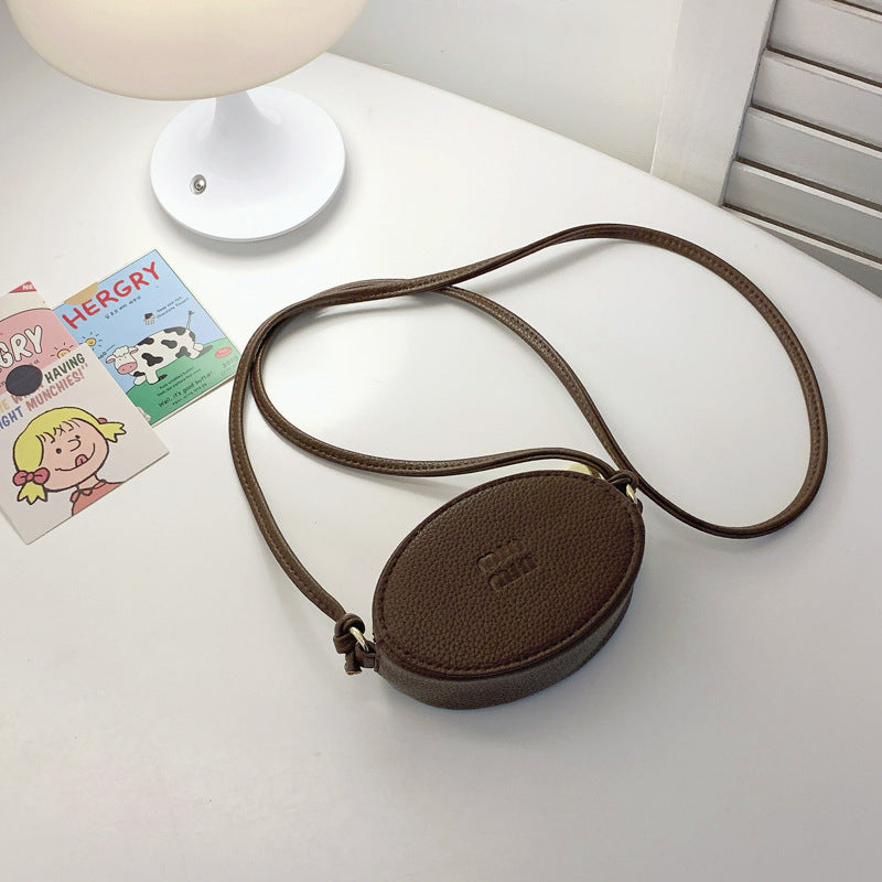 Mini Oval Crossbody Bag
