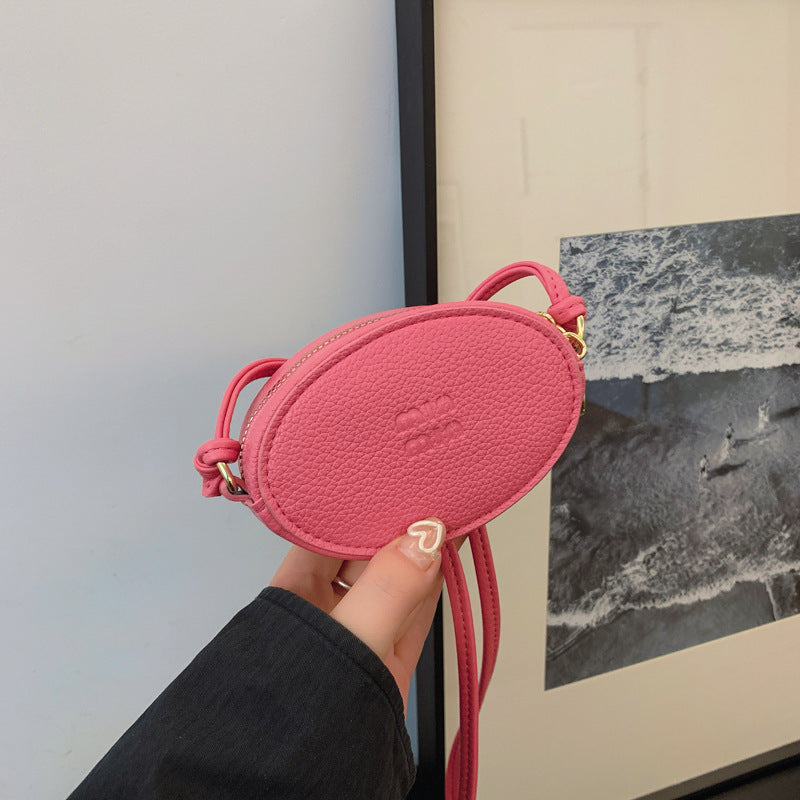 Mini Oval Crossbody Bag