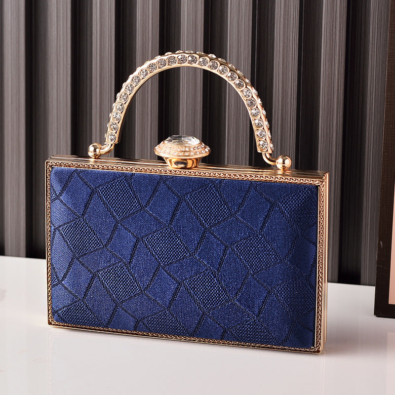 Modern Luxe Top Handle Clutch Bag