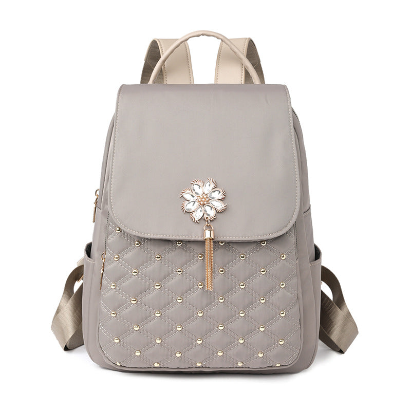 Bold Rivet Backpack