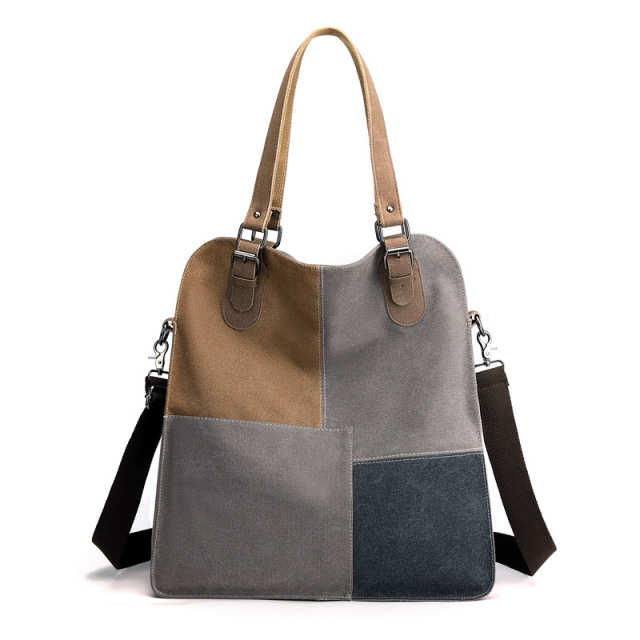 Vintage patchwork canvas shoulder bag with colorful fabric panels
