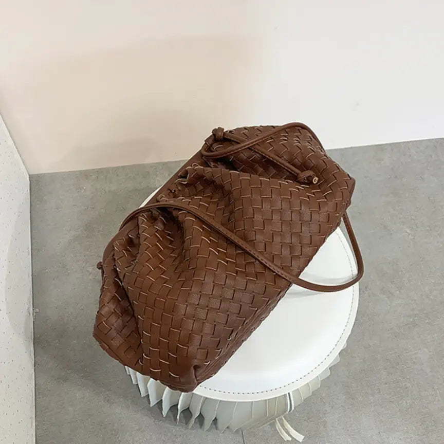 Woven Dumpling Crossbody Bag