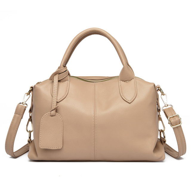 Textured women's handbag with spacious interior and stylish modern design
