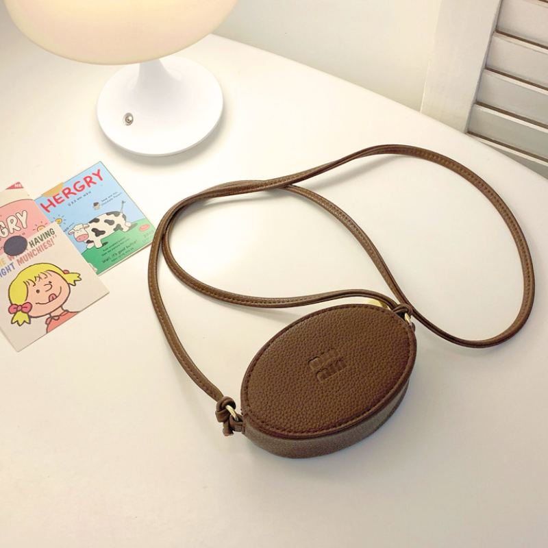 Mini Oval Crossbody Bag